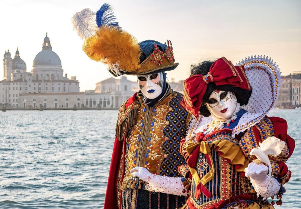 cheap stays in best 5 festivals in Europe like at Venice carnival costumes wearing couples