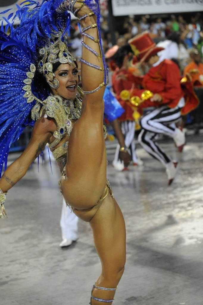 a brazialian girl showing one leg up  of her head one leg down in underwear,carnival costume Guide to 5 famous latin America festivals