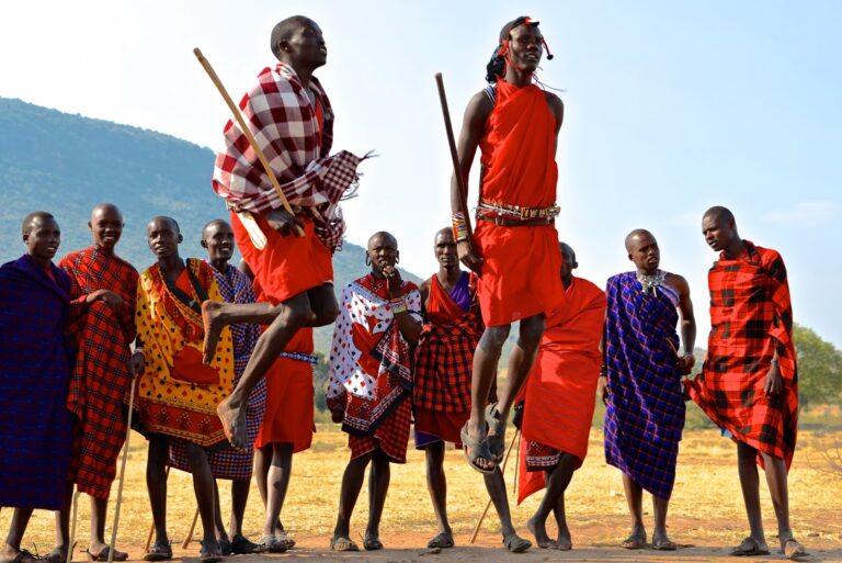 massai mara tribes in red cultural dresses -jumping higher:1 week exciting Mara safari