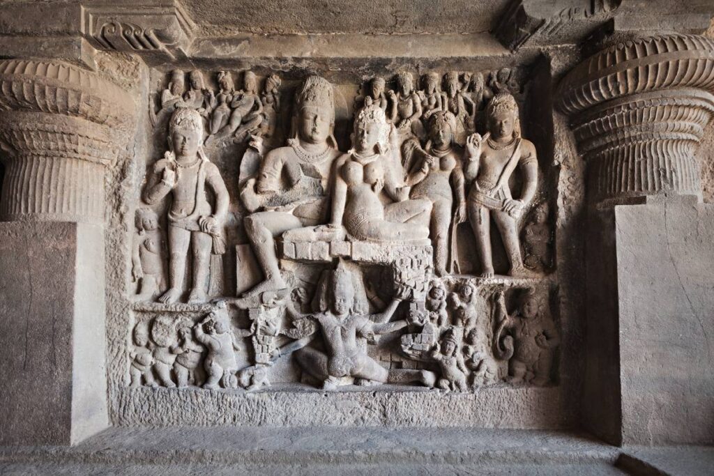 carvings of women naked and gurds half dressed-on-Ellora-and-Ajanta-Cave-walls